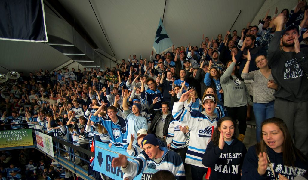 photo of university of maine student section hockey fans